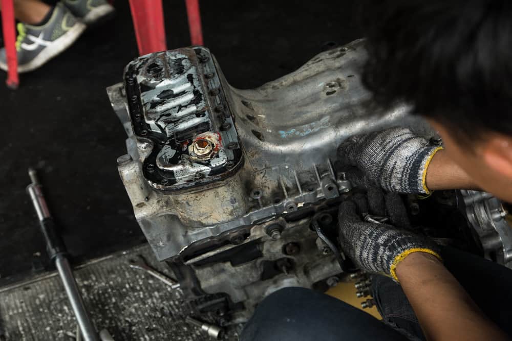 car smells like burning Engine valve car maintenance - Care my cars-min